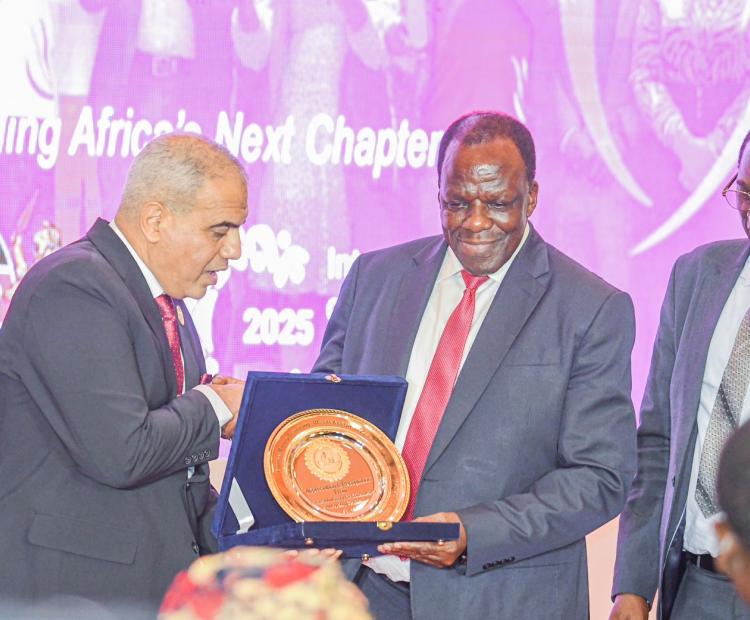 Cabinet Secretary Co-operatives and MSMEs Development alongside various dignitaries showcase award